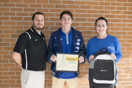 Trent Martin with, from left, Springfield High School Boys Head Basketball Coach Blake Zito and North Oaks Sports Medicine Athletic Trainer Mandy Serpas.